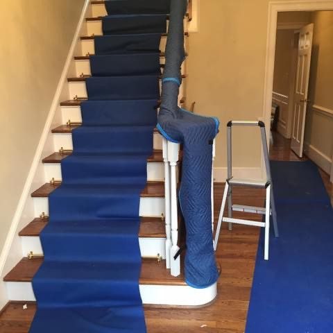 Professional blue floor and stair protection for apartment move